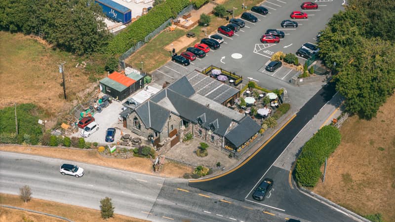 Aerial view of Bramley Lodge, its car park and the road junction at Tullagreen