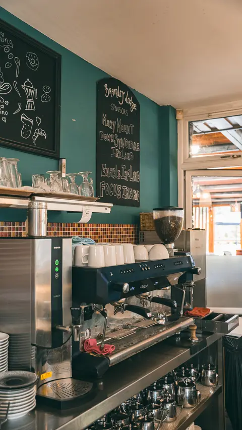 The coffee machine mid-pour