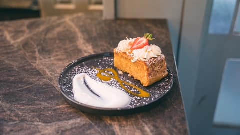 A plated slice of cake, baked in-house